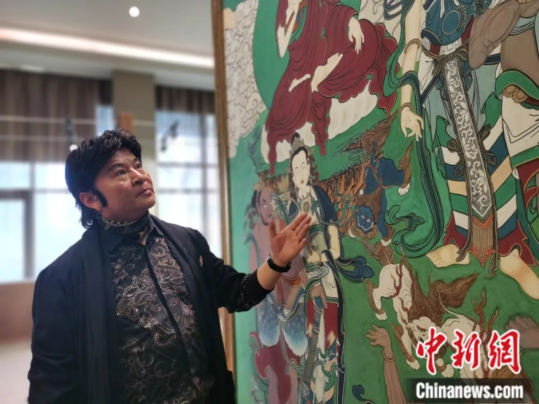 國家一級(jí)美術(shù)師劉觖。張?zhí)砀?攝