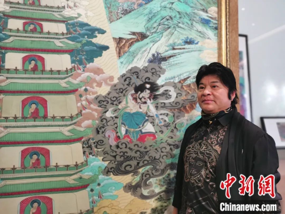 國家一級(jí)美術(shù)師劉觖。張?zhí)砀?攝